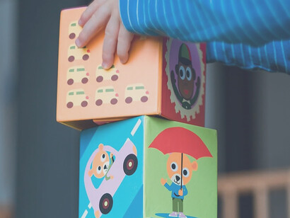 A contrast becomes apparent as certain toddlers delight in playing with toys, while others face the unfortunate deprivation of such opportunities