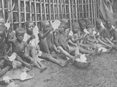 A photograph depicting Cameroonian children spinning cotton, taken by the Allies upon capturing the last German province in Africa during World War I; this image marked the first time the natives were photographed