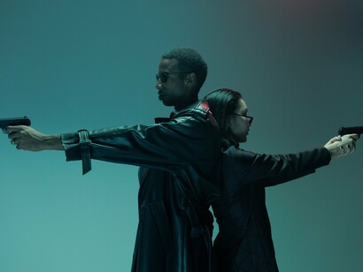 Two allies standing back-to-back, representing the trust and partnership that make The Matrix more than its action sequences