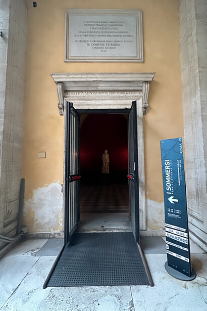The entrance to 'The Drowned' exhibition at the Capitoline Museums beckons visitors into a captivating journey through art and history, Rome, Italy 