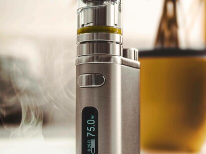 A medium-sized vaping device containing a clear liquid