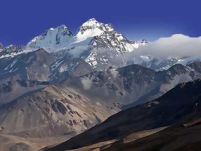 The Andes loom large in Unwelcomed, both as a physical obstacle and a silent witness to human endurance