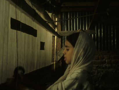 Bimba al telaio