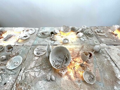 A collection of fragile art pieces and materials by Joan Crous