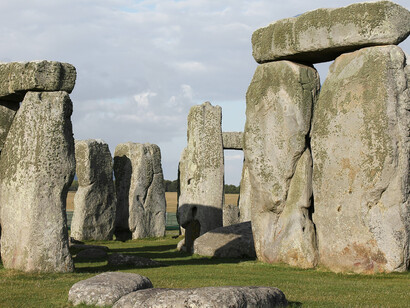 The iconic Stonehenge rising from the English countryside, a monument of resilience and ancient struggle, the UK