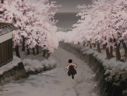 Chiyoko racing down a blossom-lined path in Millennium Actress (2001), reflecting the lifelong journey where reality and performance become inseparable