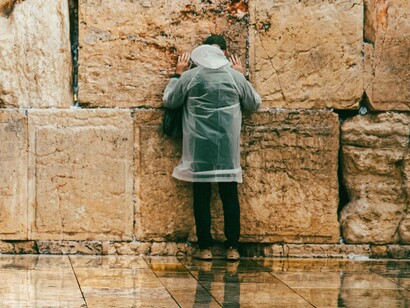 Man prays by the wailing wall, Jerusalem, Israel