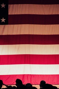 Men salute to the American flag
