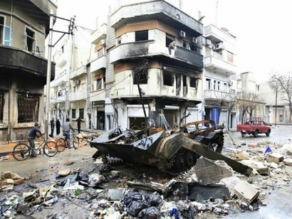 A square in Homs, full of rubbish after an explosion