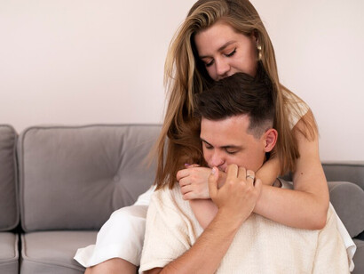 A couple sharing a romantic moment at home, showcasing their emotional intimacy, attraction, and compatibility in their relationship