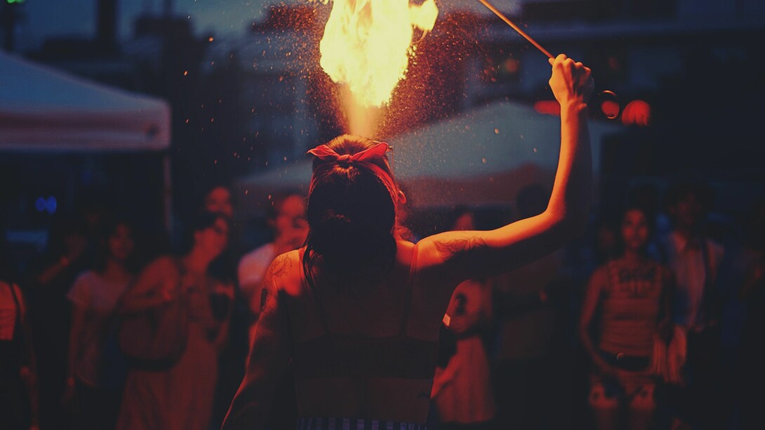 Tricks being displayed at a carnival, representing the social dilemma of pomp and facades