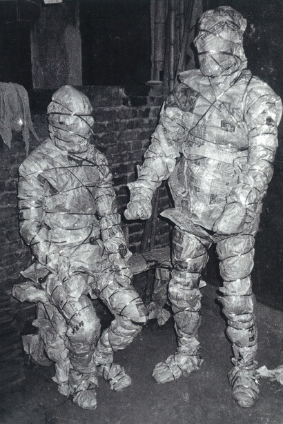 Zhang Peili and Geng Jianyi, "Wrapping Up – King and Queen", 1986, performance, paper, string, human bodies. Courtesy of Boers-Li Gallery and the Artists