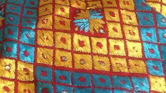 Contemporary Phulkari design and embroidery at retail dealer's store in Patiala, Punjab (India), 2015