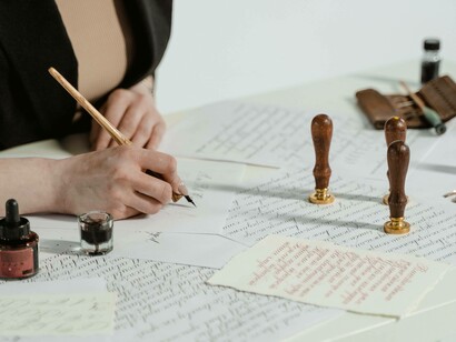 A woman penning the latest chapter of her memoir