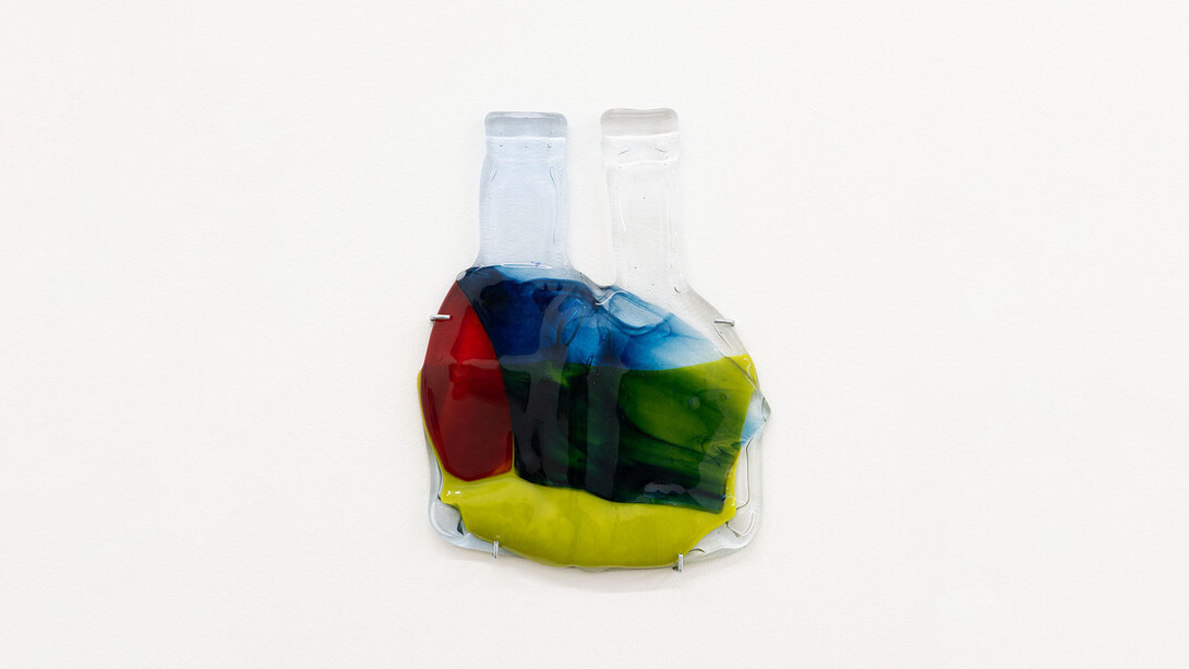 Jessica Jackson Hutchins,
Red Shoulder, 2023,
fused glass,
9 1/2h x 7 1/4w x 1/2d in,
24.13h x 18.41w x 1.27d cm. Courtesy of the artist and Adams and Ollman Gallery