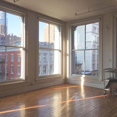 Spacious New York apartment with natural light seeping into the room
