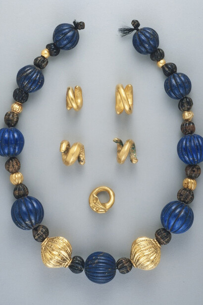 Sumerian (Mesopotamia)
Necklace with Melon-Shaped Beads and Five Spiral Ring Attachments
ca. 2600–2400 BC
Gold, lapis lazuli, and hematite
Necklace: L. 15 3/4 in. (40.0 cm)
Sidney and Lois Eskenazi Museum of Art, Burton Y. Berry Collection