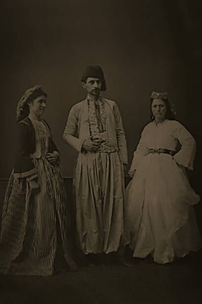 Studio portrait of models wearing traditional clothing from the province of Syria, Ottoman Empire