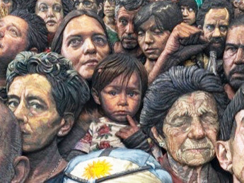 A child is in the centre of both demonstrations, the only one looking at the viewer, asking, 'What happens now?'