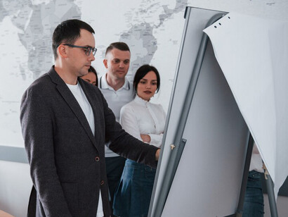 Business professionals and managers collaborating on international development projects to promote sustainable development through effective development cooperation
