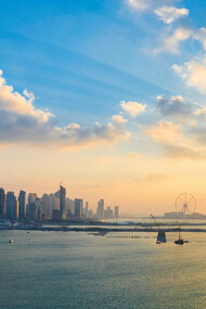 A panoramic view of the Dubai Marina skyline in the United Arab Emirates at sunset. The UAE is a federation of seven emirates: Abu Dhabi (capital), Dubai, Sharjah, Ajman, Umm Al Quwain, Ras Al Khaimah, and Fujairah