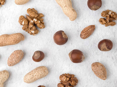Flat lay of nuts highlighting magnesium sources for improved sleep quality and the gut-brain axis connection