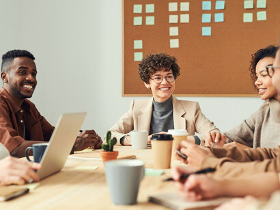 A workplace driven by connected devices, representing the blurred line between productivity and risk