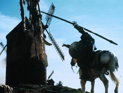 Don Quijote peleando contra un molino
