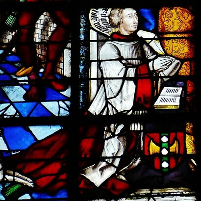 Charles de Bovelles, raffigurato nella vetrata dedicata a Santa Caterina, inginocchiato davanti alla santa, 1521, Basilica di San Quintino, Saint-Quentin, Francia