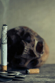 A close-up photo of burnt cigarette ashes