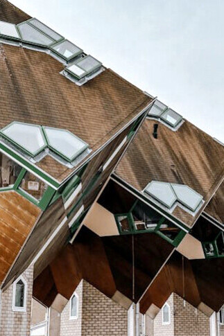 The Cube Houses in Helmond began as a pilot project of three units, followed by a larger set of 18 cube-shaped stilt houses designed by Piet Blom. He later applied the same concept in Rotterdam. Originally, the 18 houses formed an architectural ensemble with Theater 't Speelhuis, which was destroyed by fire in 2011