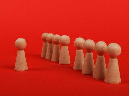 A leader engaging opposing sides, symbolizing the effort to transform polarization into understanding and cooperation
