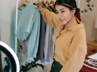 Person sharing her clothes on social media