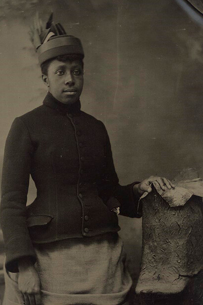 American, Woman with Coat and Hat, 1880s–1910s, tintype, the Museum of Fine Arts, Houston, Museum purchase funded by Bill and Sara Morgan.