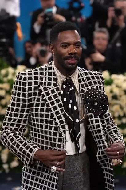 Colman Domingo in Valentino, wearing a black-and-white windowpane tailored suit, patterned tie during the 2025 Met Gala