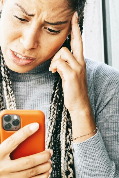 Woman confused by her social media feed