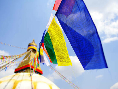 Buddhanath Stupa, located in Boudha, Kathmandu, Nepal, is one of the largest Buddhist stupas in the world and a sacred site for Tibetan Buddhists, symbolizing peace and harmony