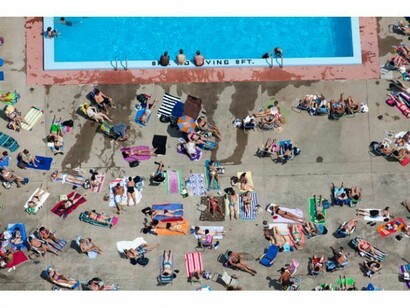 Alex MacLean, Poolside Tanning, Cambridge, Massachusetts, USA, 2012, copyright © Alex MacLean Huxley-Parlour Gallery