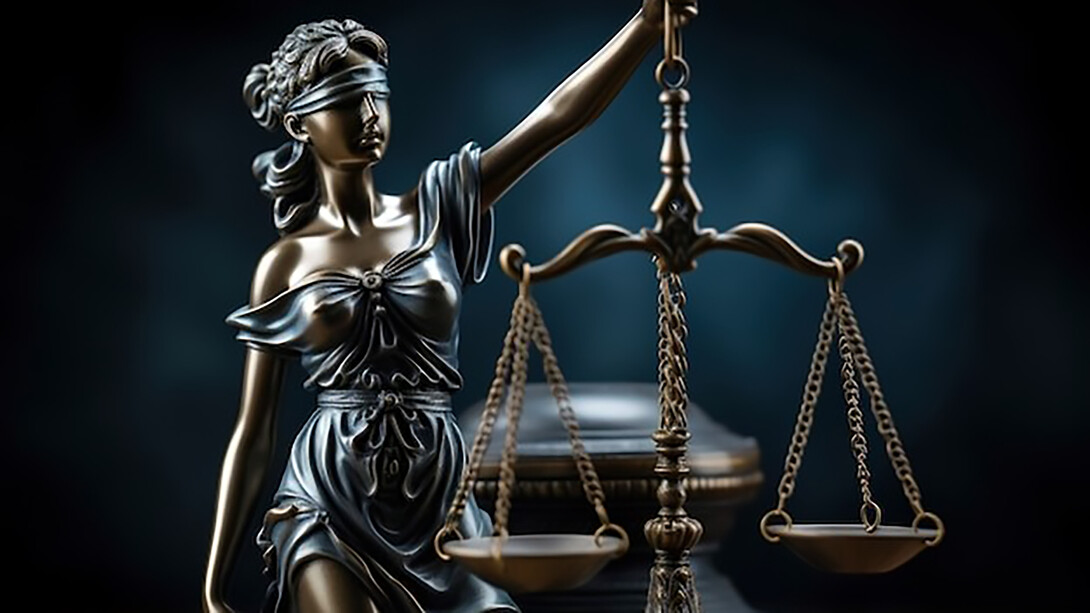 A three-dimensional representation captures the iconic scales of justice, offering a symbolic and visually impactful view
