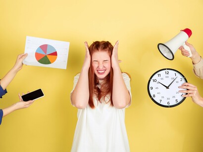 A young woman, eyes shut and hands covering her ears, is bombarded with symbols of productivity—a clock, a pie chart, a smartphone, and a megaphone—representing the modern obsession with efficiency