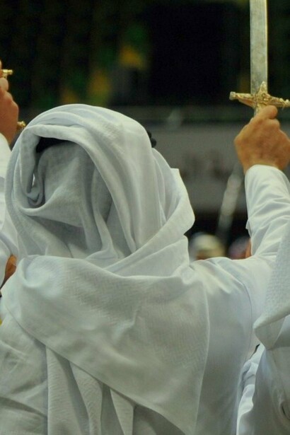 Men demonstrating their swords in Saudi Arabia