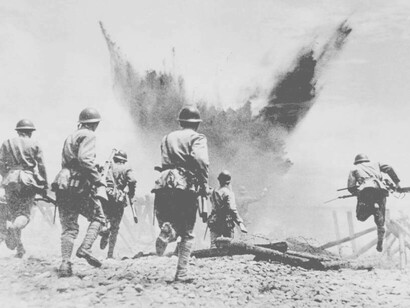 Soldiers dodging explosions on the beaches of Europe during WW2