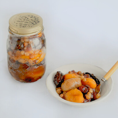 Nuts, figs, prunes, raisins, cranberries and honey are always found on the table
