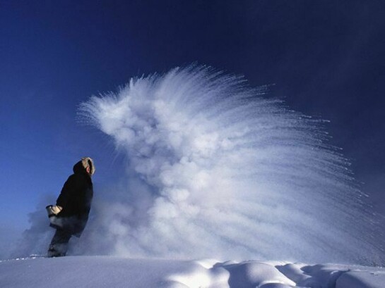 When thrown into cold air at - 53º C boiling water explodes into vapour & ice. Yakutia, north east Siberia. (1999)
