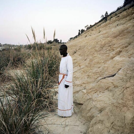 Mike Dwjela, after his evening prayer, Boysens, Johannesburg, 2010 Archival pigment print, 45 x 45cm, © Jason Larkin, courtesy of Flowers Gallery