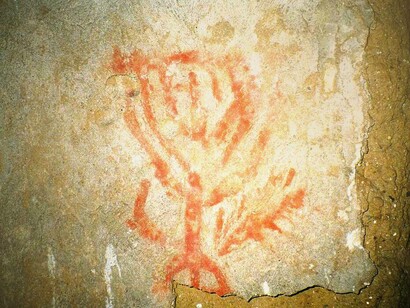 Jewish emblems painted on the wall next to the doorway of a burial chamber in the catacombs of Vigna Randanini, Rome, Italy