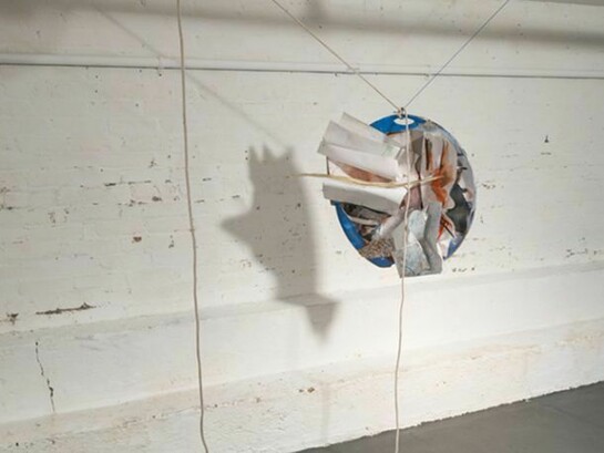 Eric Mack, Palm as fragment, 2013, wood, paper, newspaper, dye, ink, acrylic paint , rope and magazine image, 77 x 76 x 32 inches