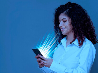 A person using a smartphone, with facial recognition technology, biometric security, and AI surveillance highlighting privacy and identification issues