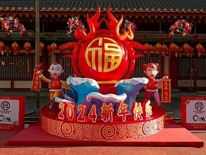 Vibrant street decorations in Singapore's Chinatown capture the festive energy and forward momentum of the Lunar New Year