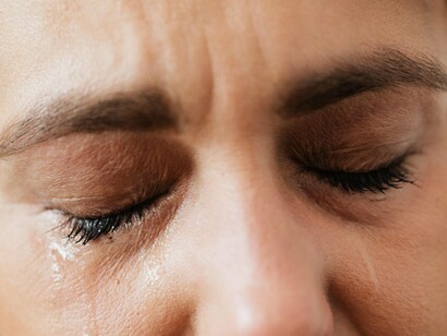 Woman crying with tears